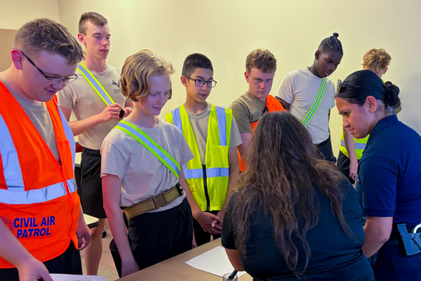 Civil Air Patrol students learning fingerprinting