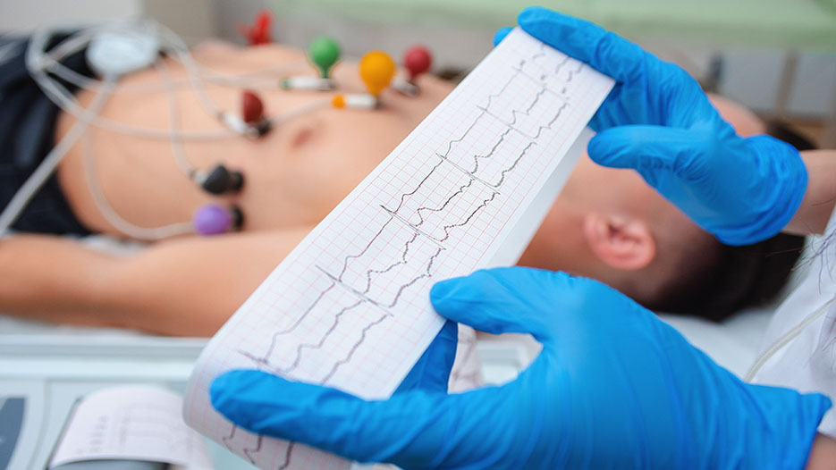 EKG Technician reading an EKG