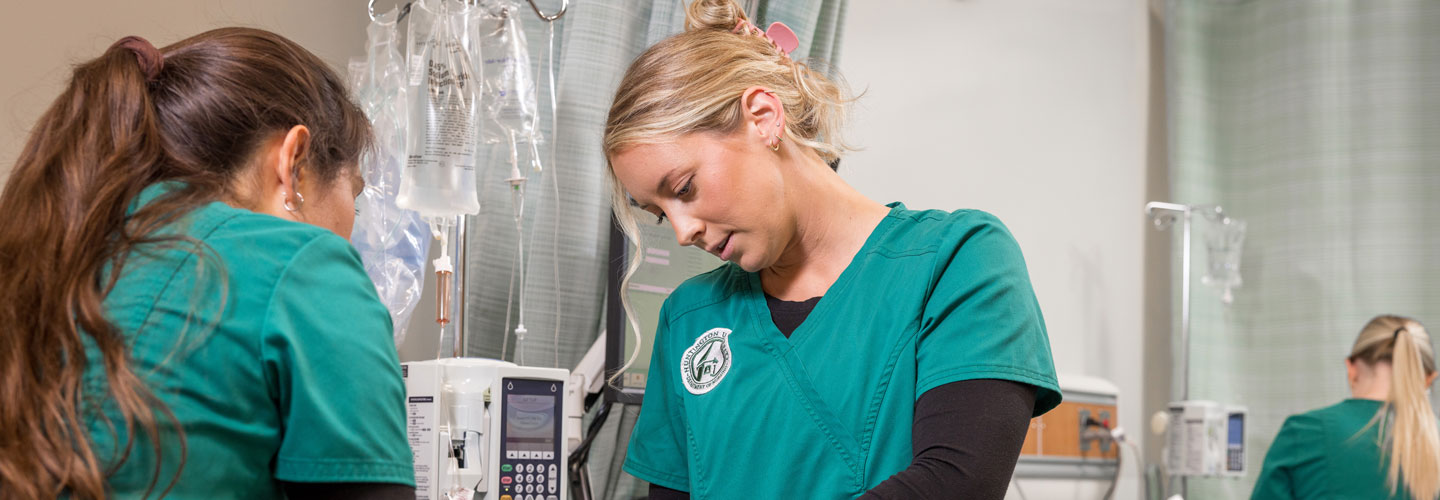 Student practicing on a dummy