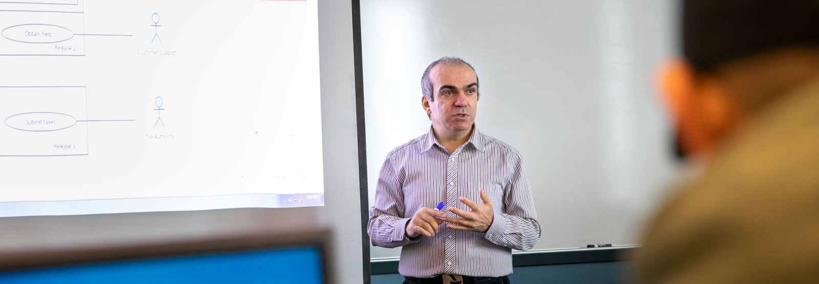 Dr. Stephanos Mavromoustakos demonstrating a data flow diagram