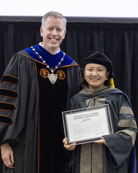 Dr. Jia Cai receiving the Leepoxy Award