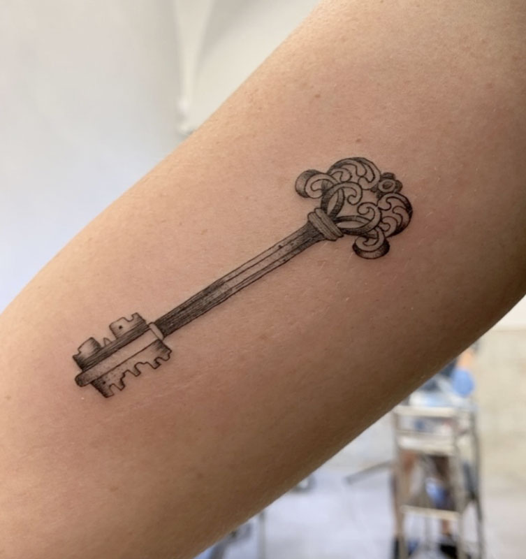 Tattoo of an old house key in Florence